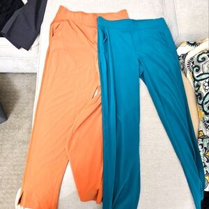 Athleta travel pants 2 pairs teal and burnt orange Size 6